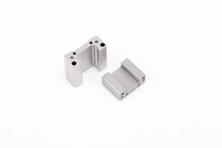MIM material and component examples